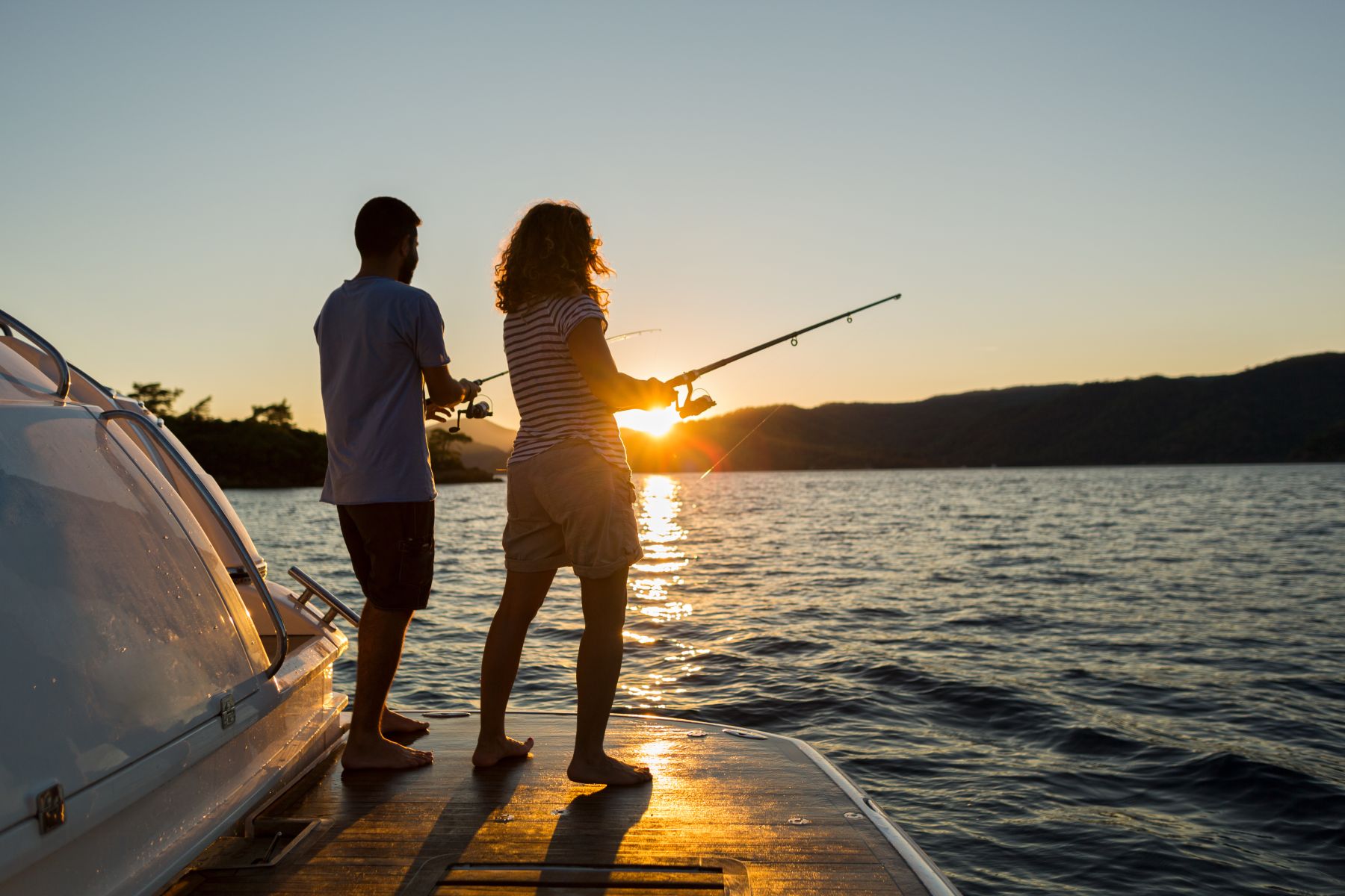 lake fishing charter sunset