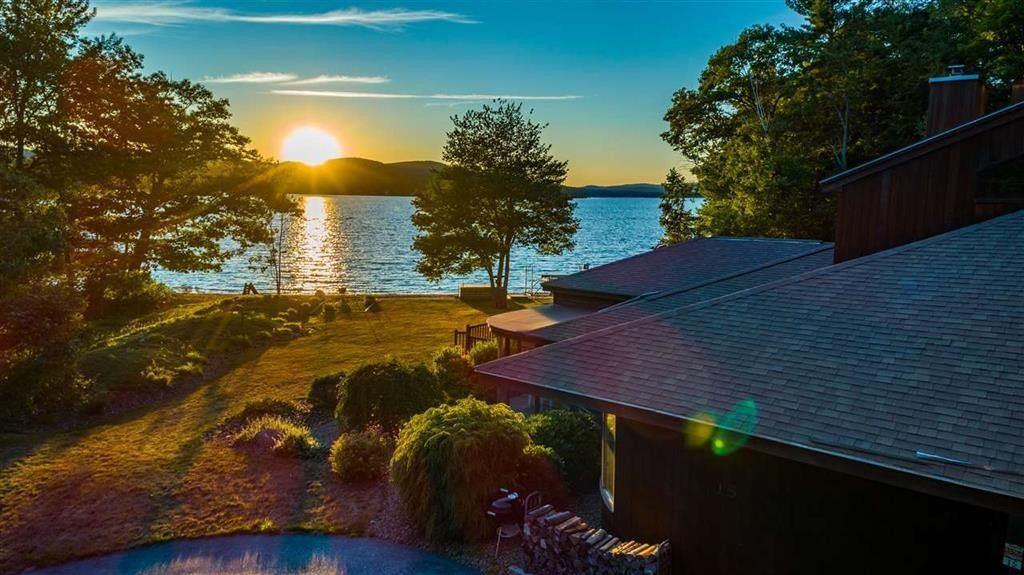 Sandy Feet rental with sunset over lake